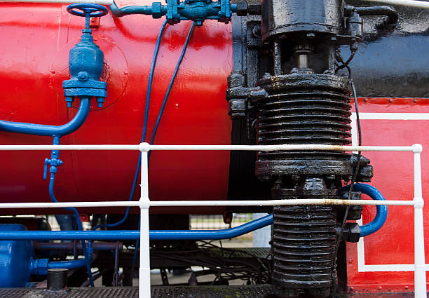 Closeup of the old steam locomotive's boiler and smokebox Closeup of the old steam locomotive's boiler and smokebox. firebox steam engine part stock pictures, royalty-free photos & images