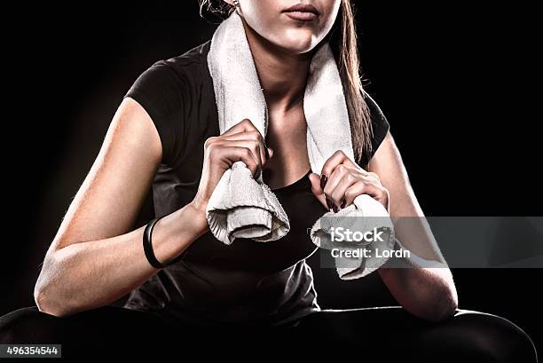 Fitness Girl With Towel On Black Background Detail Stock Photo - Download Image Now - Towel, Exercising, Black Background
