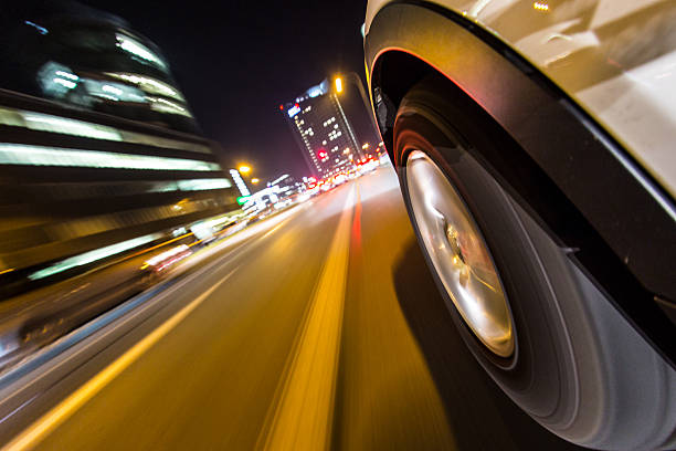 istock Night city from the car back view. 496354760