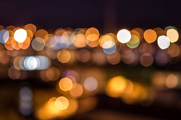 istock Defocused city lights during night background bokeh- stock image 496354850