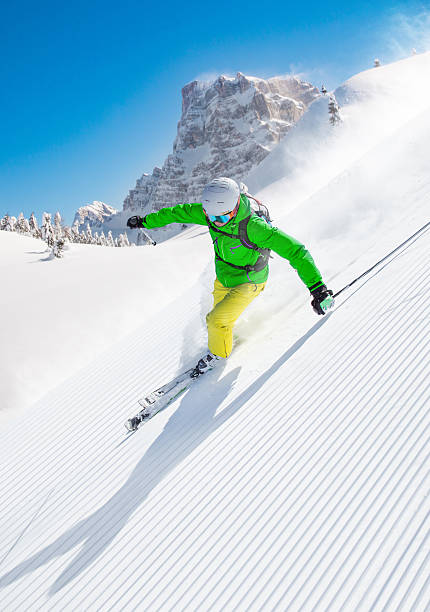istock Skier skiing downhill in high mountains 496355862