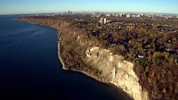 Aerial view of Scarborough Bluffer's Park with Toronto downtown as far away background.