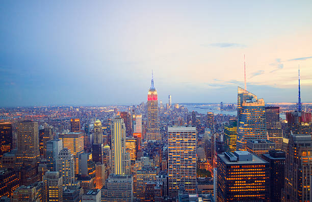 istock Manhattan cityscape with Empire State Building at night 496381012