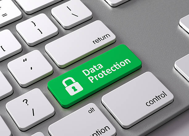Data Protection A keyboard with a green button Data Protection encryption stock pictures, royalty-free photos & images