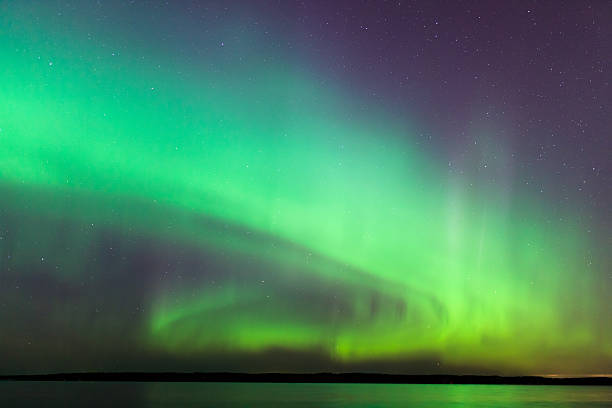 istock Northern lights over lake in finland 496385760