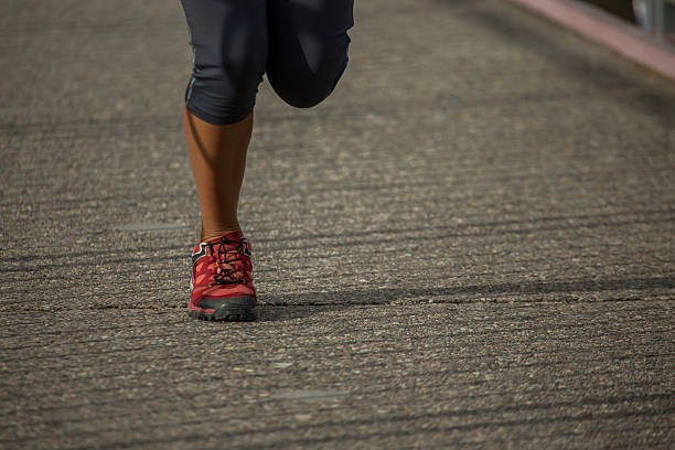 Close up shot feet with motion blur of the Competitors running in the half marathon are running special for the 100th anniversary of Izmir's liberation.