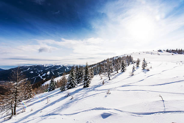 istock Landscape of a mountain range during sunny winter day. 496387490