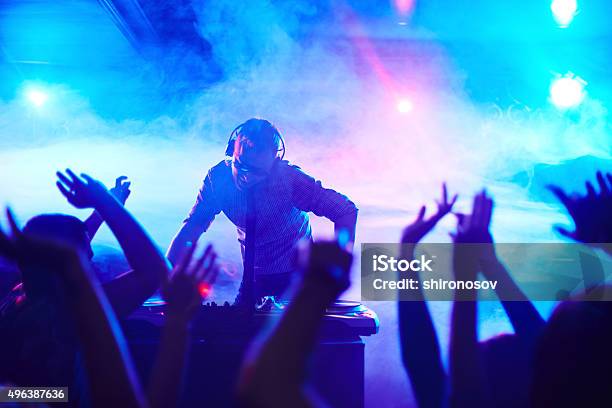 Deejay In Club Stock Photo - Download Image Now - DJ, Nightclub, Party - Social Event