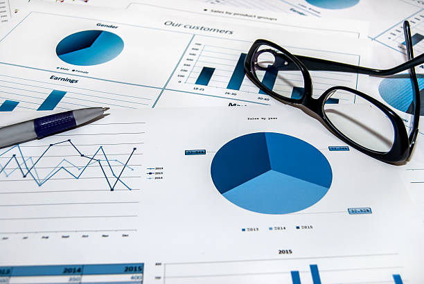 istock Pen with glasses on the charts 496389266