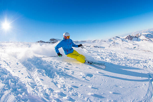 istock Skier skiing downhill in high mountains 496402880