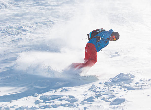 istock Skier skiing downhill in high mountains 496402930