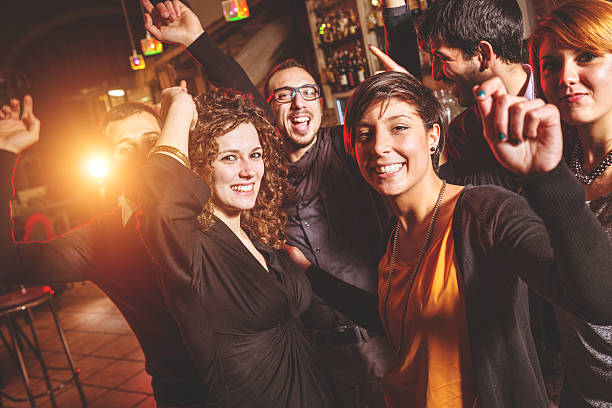 istock People happiness at the disco club 496403027