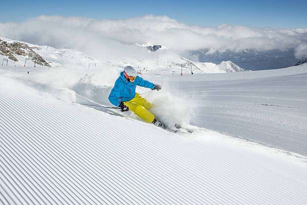 istock Skier skiing downhill in high mountains 496403266