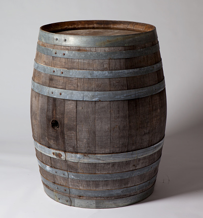old wine barrel on plain background