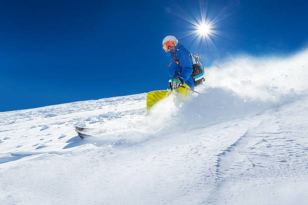istock Skier skiing downhill in high mountains 496403412