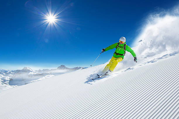 istock Skier skiing downhill in high mountains 496403454