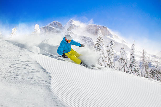 istock Skier skiing downhill in high mountains 496403570