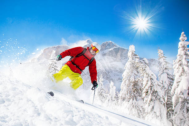 istock Skier skiing downhill in high mountains 496403622