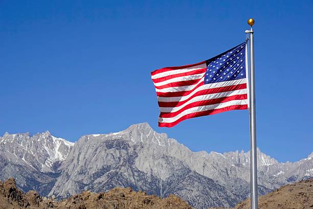 istock American Flag and Sierra Nevada Mountain Range 496403831