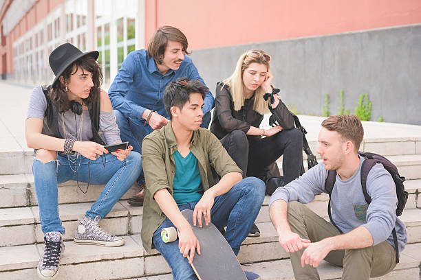 istock Group of young multiethnic friends having fun 496408220