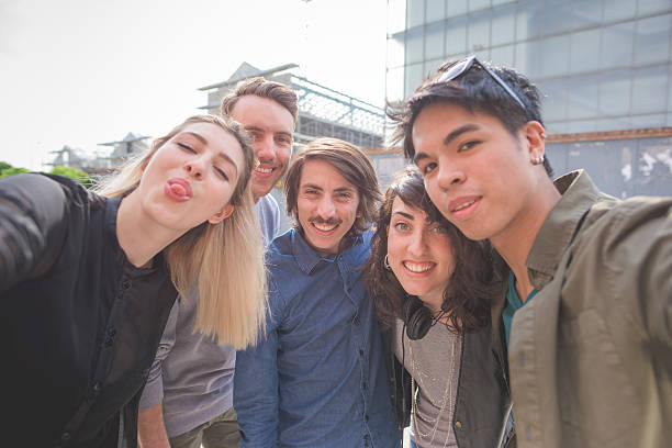 istock Group of young multiethnic friends having fun 496408476