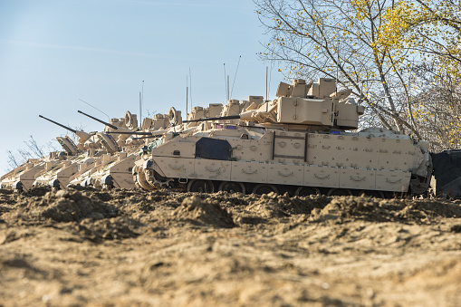 A Line of M2 Bradley Infantry Fighting Vehicles. 