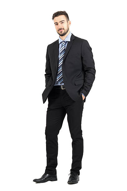 istock Young confident bearded business man in suit looking at camera 496412888