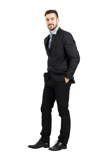 istock Confident happy business man with hands in pocket side view 496412952