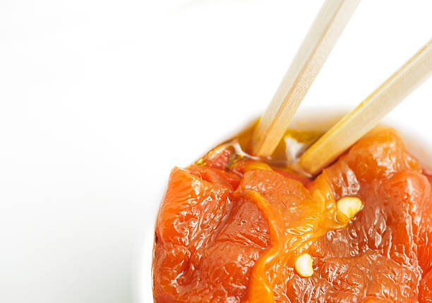 istock Close up of roasted pepper salad on white background. 496414228