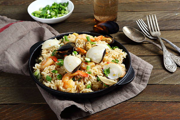 istock Spanish paella with seafood and spices 496429578