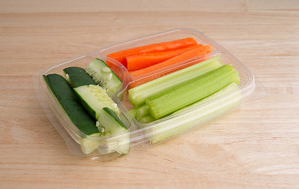 istock Carrots celery and cucumbers in a plastic tray 496430380