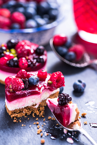 Berry fruit winter cheesecake on serving board