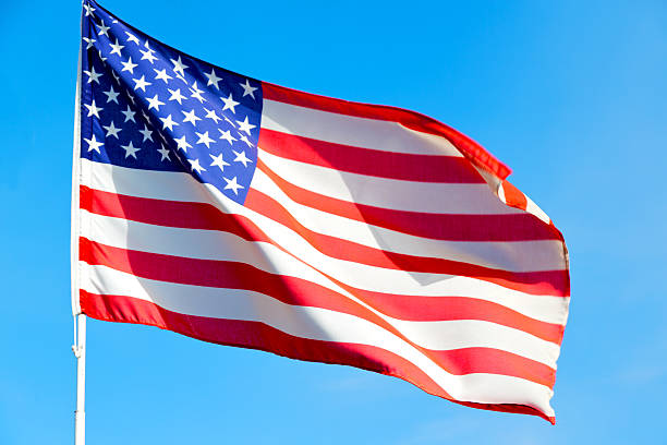 istock usa waving flag in the   and wave 496432130