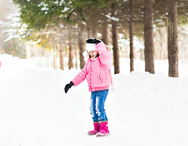 istock funny child in winter park 496432152