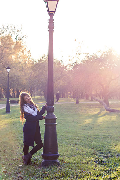 istock beautiful girl at sunset 496432636