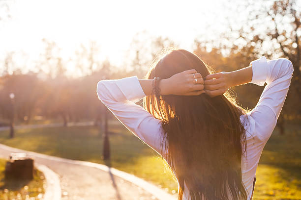 istock beautiful girl at sunset 496432692