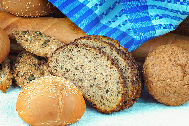 istock Assortment of bread and tablecloth 496433074