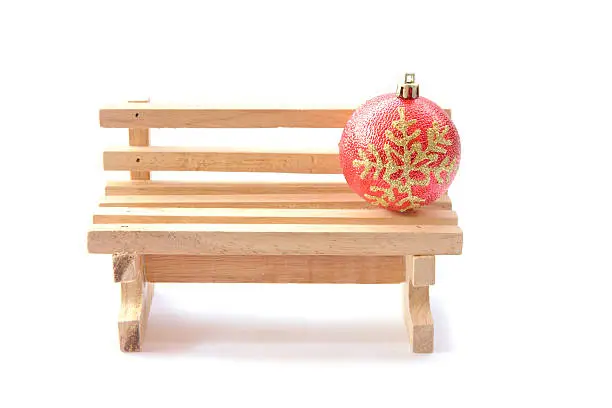 Christmas decoration on wooden chair in white background