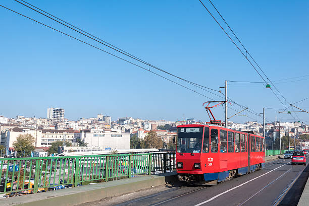 Belgrade, Serbia - October 24, 2015: Tram is moving on Old Sava Bridge in Belgrade. The bridge connects Old and New Belgrade. It is used by trams, buses and cars. Many people uses trams every day in Belgrade.