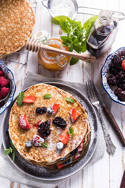 istock Celebrating Pancake Day with crepes 496435460