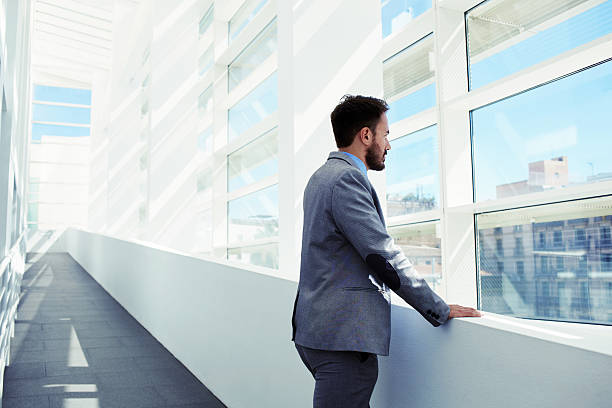 istock Serious prosperous man economist dressed in suit enjoying calm 496435668
