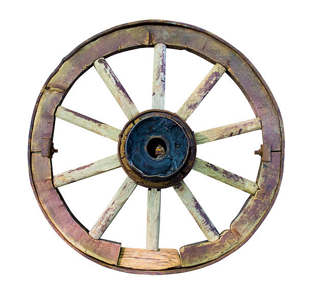 wheel isolated Big vintage rustic wooden wagon wheel isolated on white rusty old wagon detail stock pictures, royalty-free photos & images