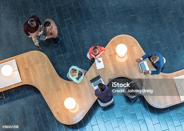 Business People Meeting In Modern Office View From Above Stock Photo - Download Image Now
