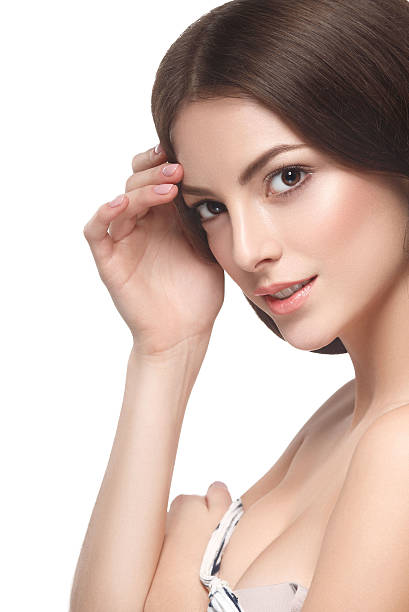 istock Beautiful woman portrait face close up studio on white 496441658
