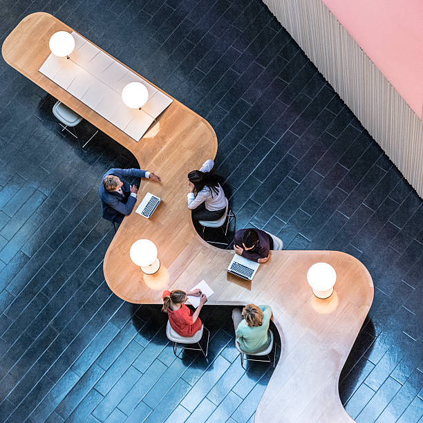 istock Business people meeting in modern office, view from above 496441802