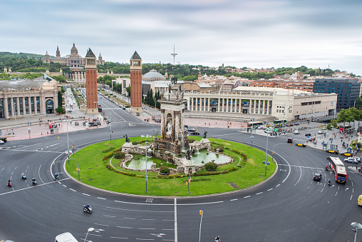 Barcelona, Spain - July 27, 2015: Spain square, also known as Plaza de España in Spanish. The Museu Nacional d’Art de Catalunya in background. Barcelona, Catalonia, Spain.