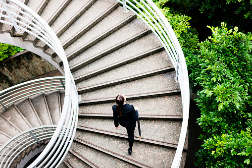 Spacious, clean and bright indoor spiral staircase