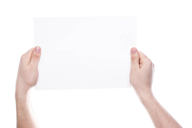 istock Hands holding a white card isolated on white background 496443729