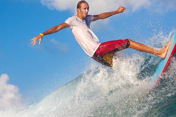 istock Surfing a Wave. Bali Island. Indonesia. 496443883