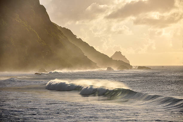 Waves at sunset, Fernando de Noronha, Pernambuco (Brazil) stock photo
